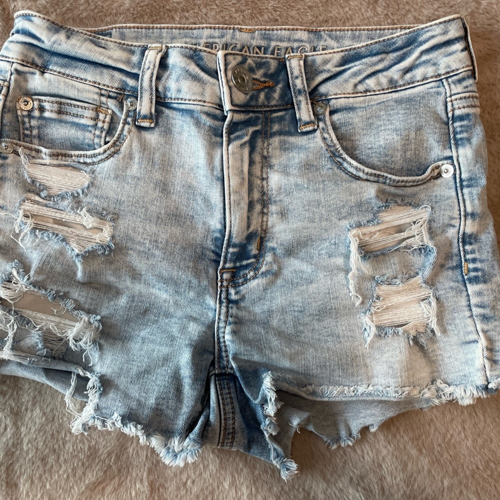 AE NEXT LEVEL STRETCH HIGH-WAISTED RIPPED JEAN SHORTS